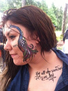 I love peacocks. And so does she. Also, in henna: "not all who wander are lost."