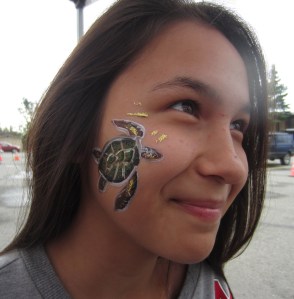 Sea turtle face painting. She could hardly keep from laughing while I was painting her. 