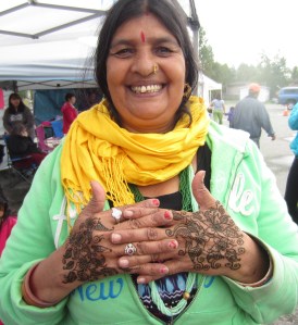 A Bhutanese-Alaskan woman whose harvest was sold at the festival. She was wonderful to do henna on--although I'm sure she's seen much more authentic mendhi henna than I have!