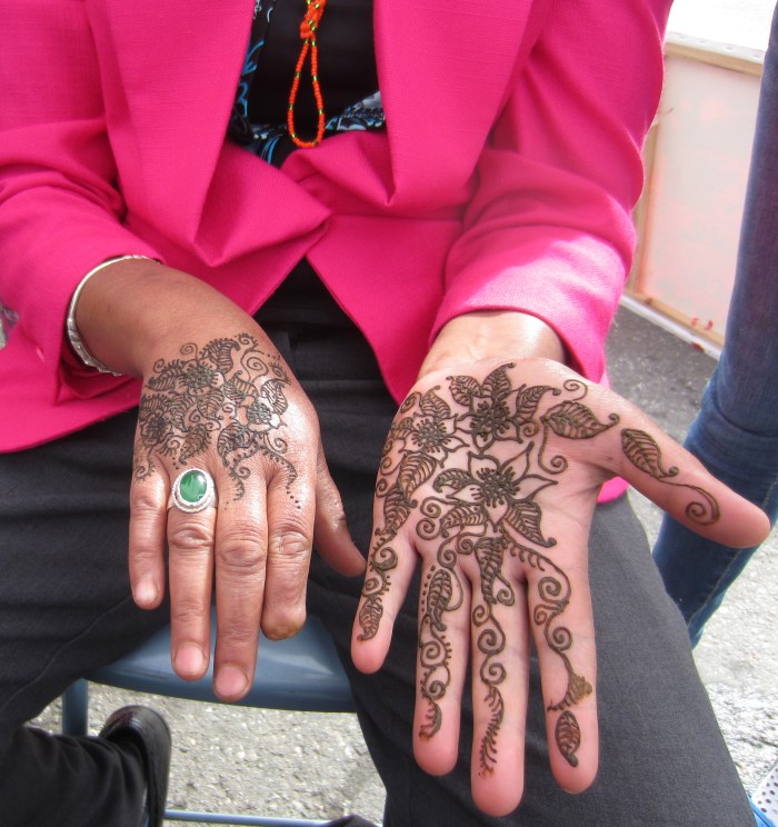 Face painting and henna at St. Anthony's Harvest Fesitval in Anchorage AK by Sarah Glaser