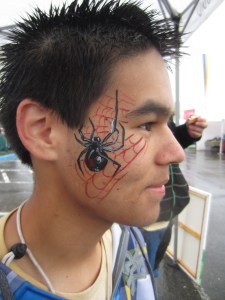 Black widow face painting. Complete with web!